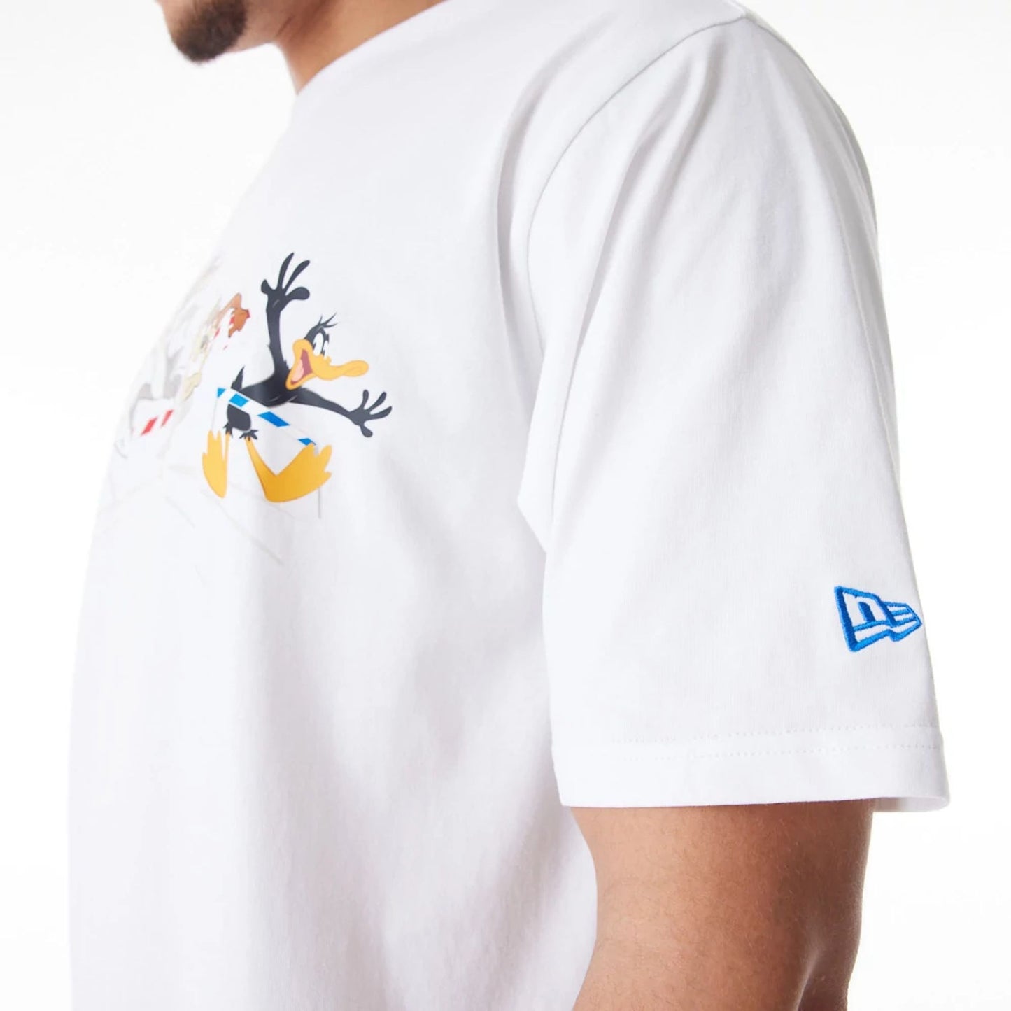 The Male model is wearing Multi Character Team Looney Tunes White Oversized T-Shirt 3