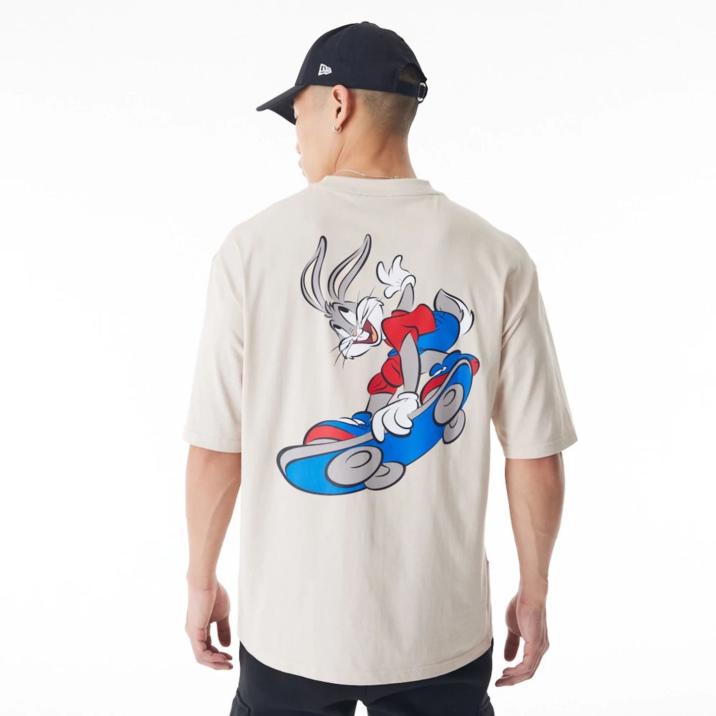 The Male model is wearing Bugs Bunny Team Looney Tunes Stone Oversized T-Shirt 2