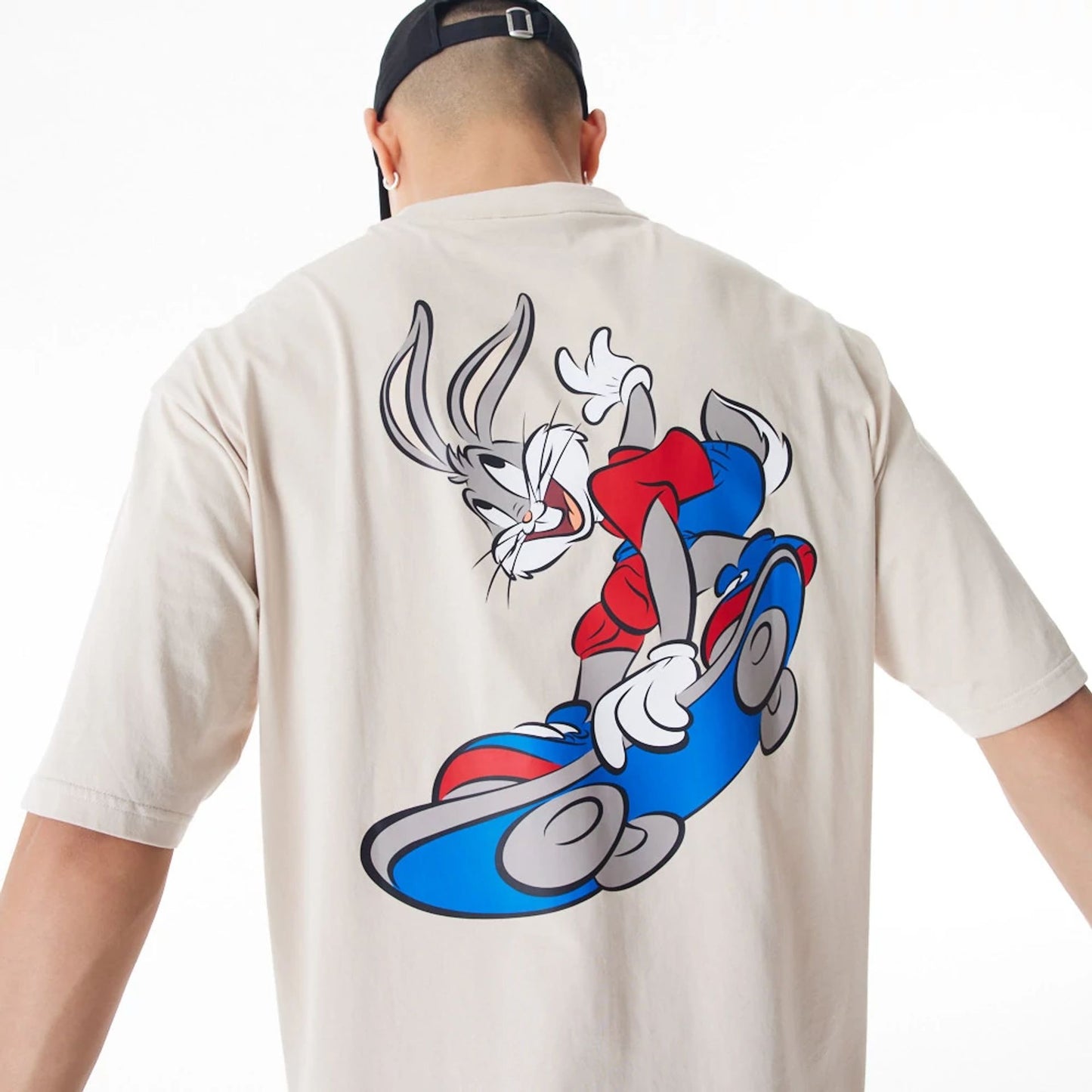 The Male model is wearing Bugs Bunny Team Looney Tunes Stone Oversized T-Shirt 5