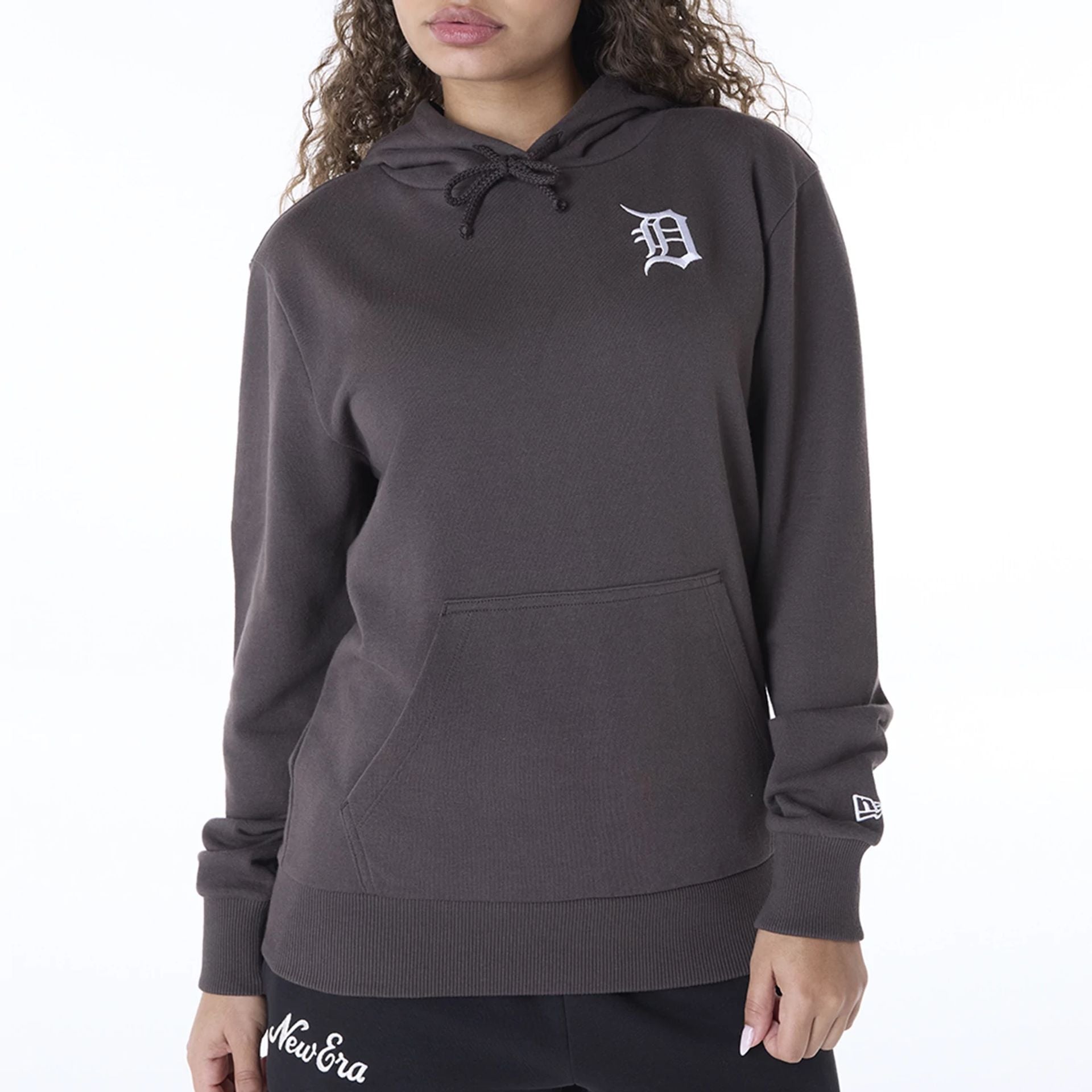 The Female model is wearing Detroit Tigers Womens MLB League Essential Dark Brown Pullover Hoodie 2