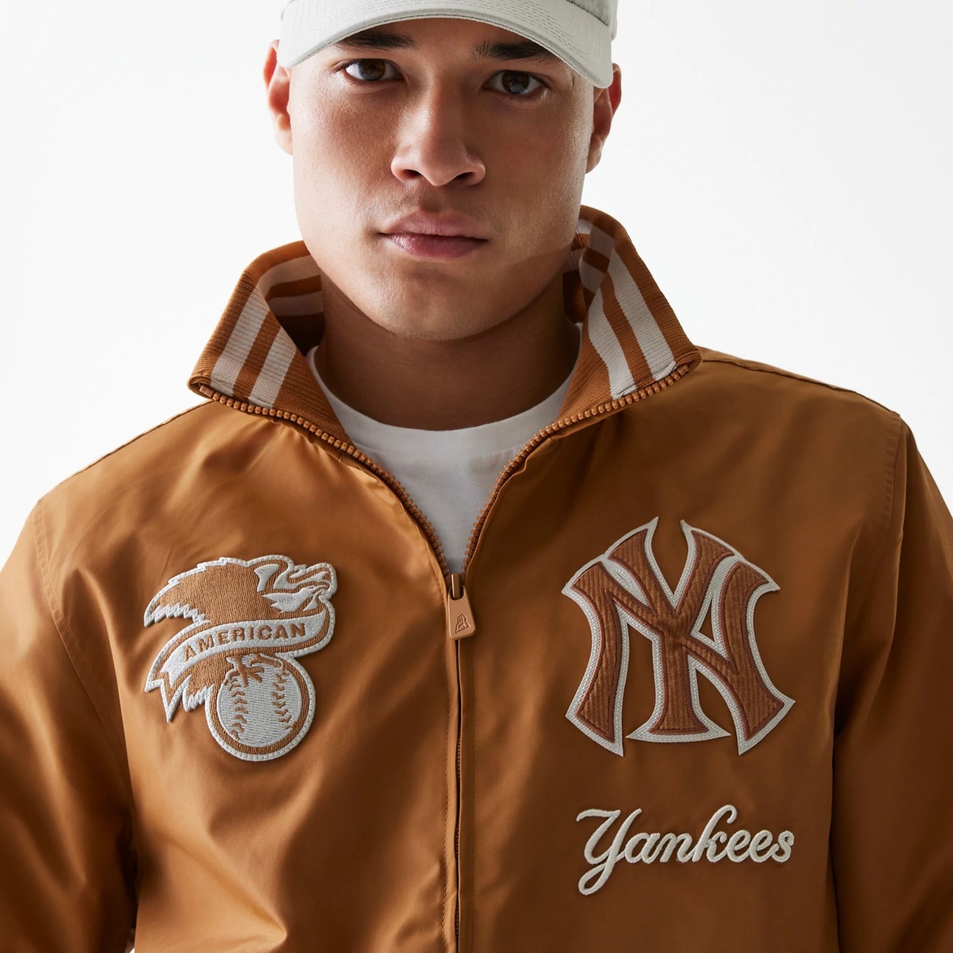 The Male model is wearing New York Yankees Logo Select Fashion Beige Full Zip Jacket 5