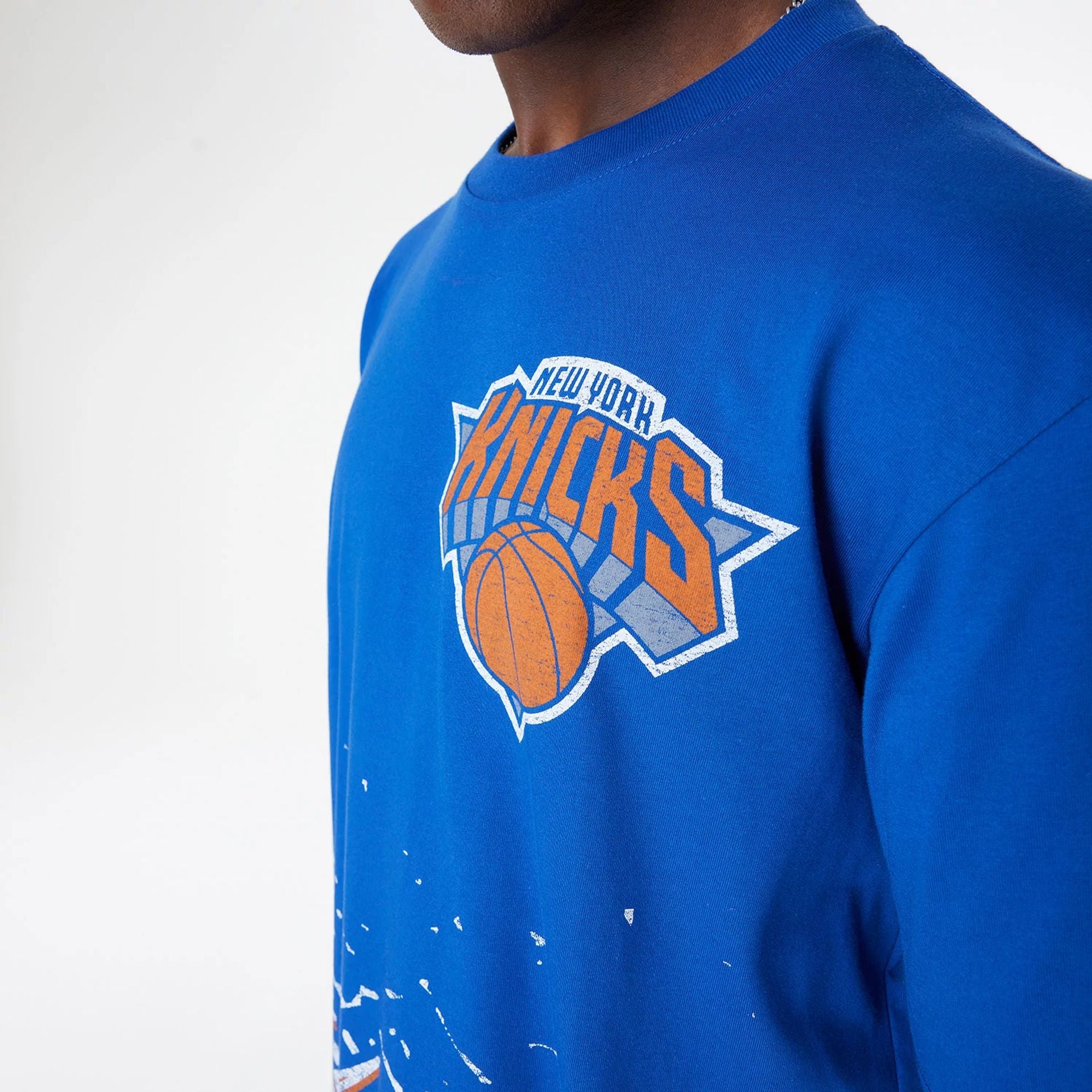 The Male model is wearing New York Knicks Sport Classic Blue T-Shirt 5