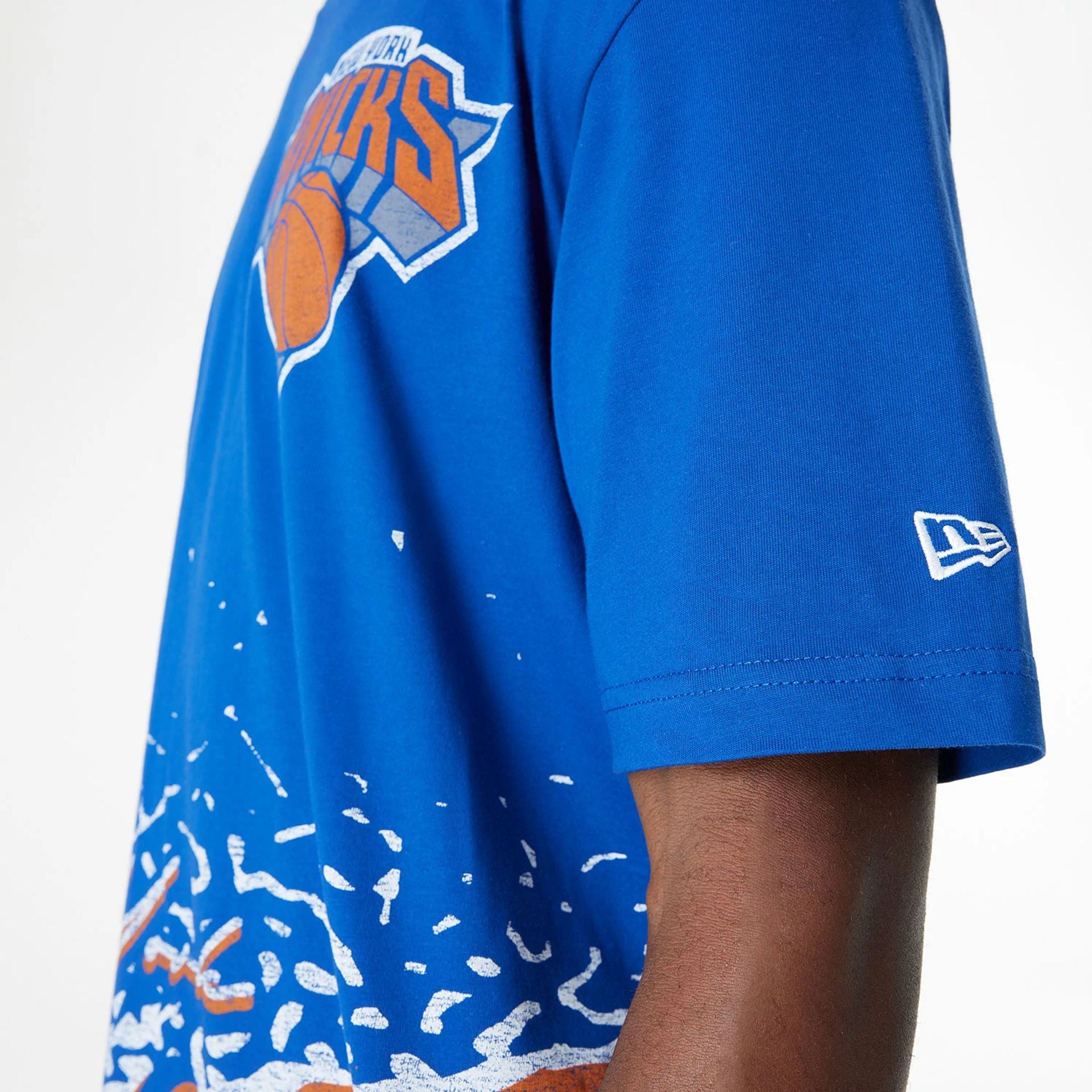 The Male model is wearing New York Knicks Sport Classic Blue T-Shirt 4