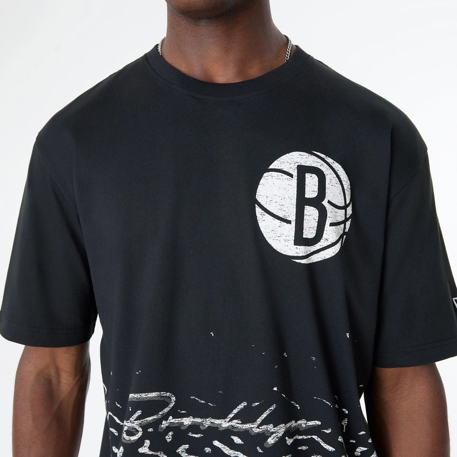 The Male model is wearing Brooklyn Nets Sport Classic Black T-Shirt 3