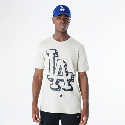 The Male model is wearing LA Dodgers Official Doodles Light Beige T-Shirt 1