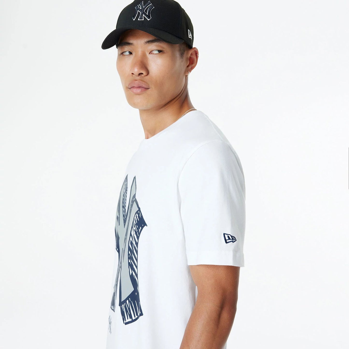 The Male model is wearing New York Yankees Official Doodles White T-Shirt 7