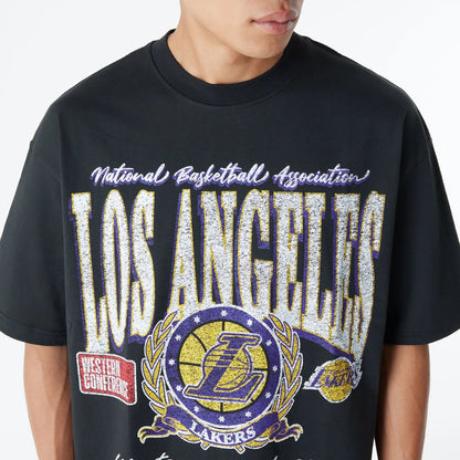 The Male model is wearing LA Lakers Oversized Essential Black Oversized T-Shirt 5