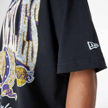 The Male model is wearing LA Lakers Oversized Essential Black Oversized T-Shirt 4