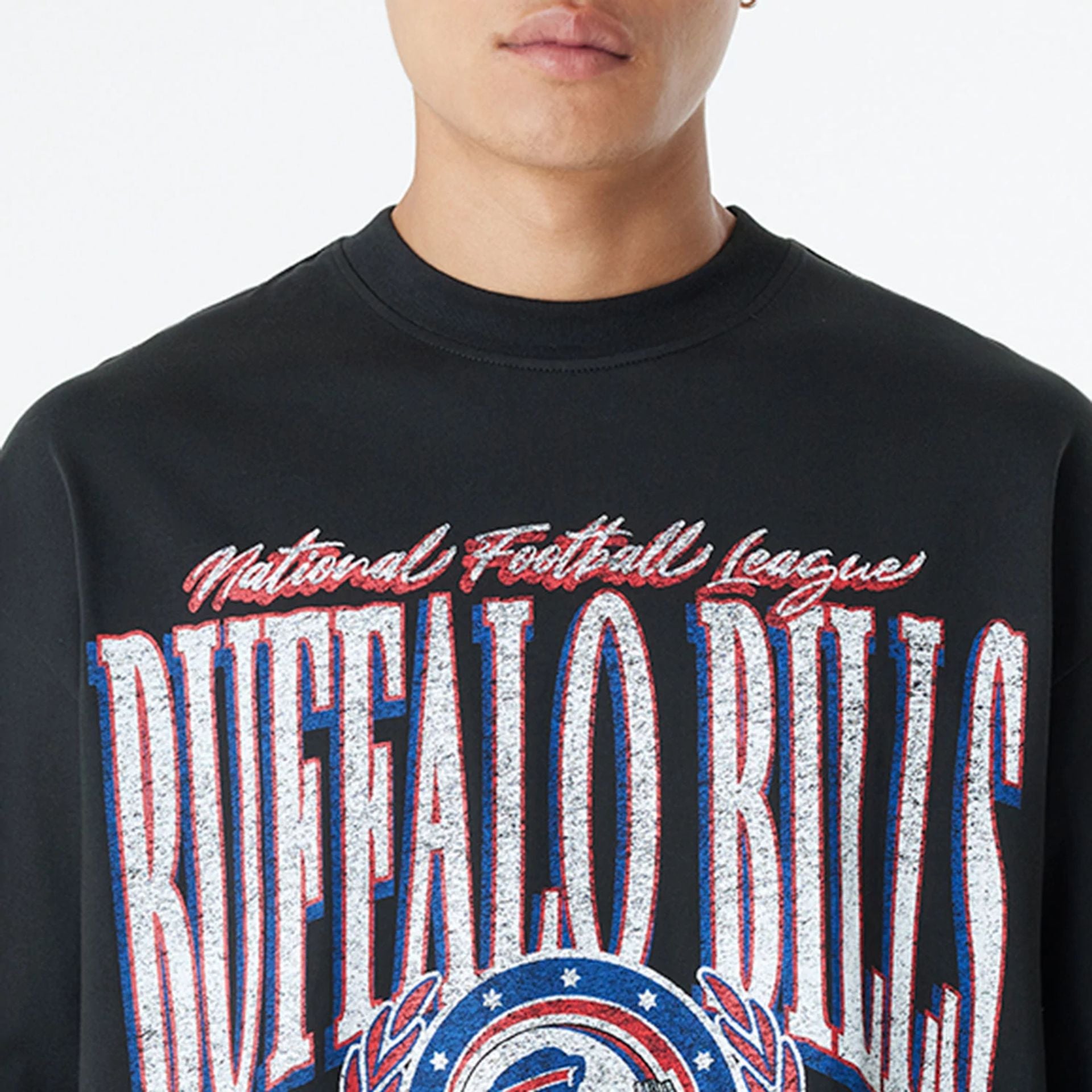 The Male model is wearing Buffalo Bills Oversized Essential Black Oversized T-Shirt 5