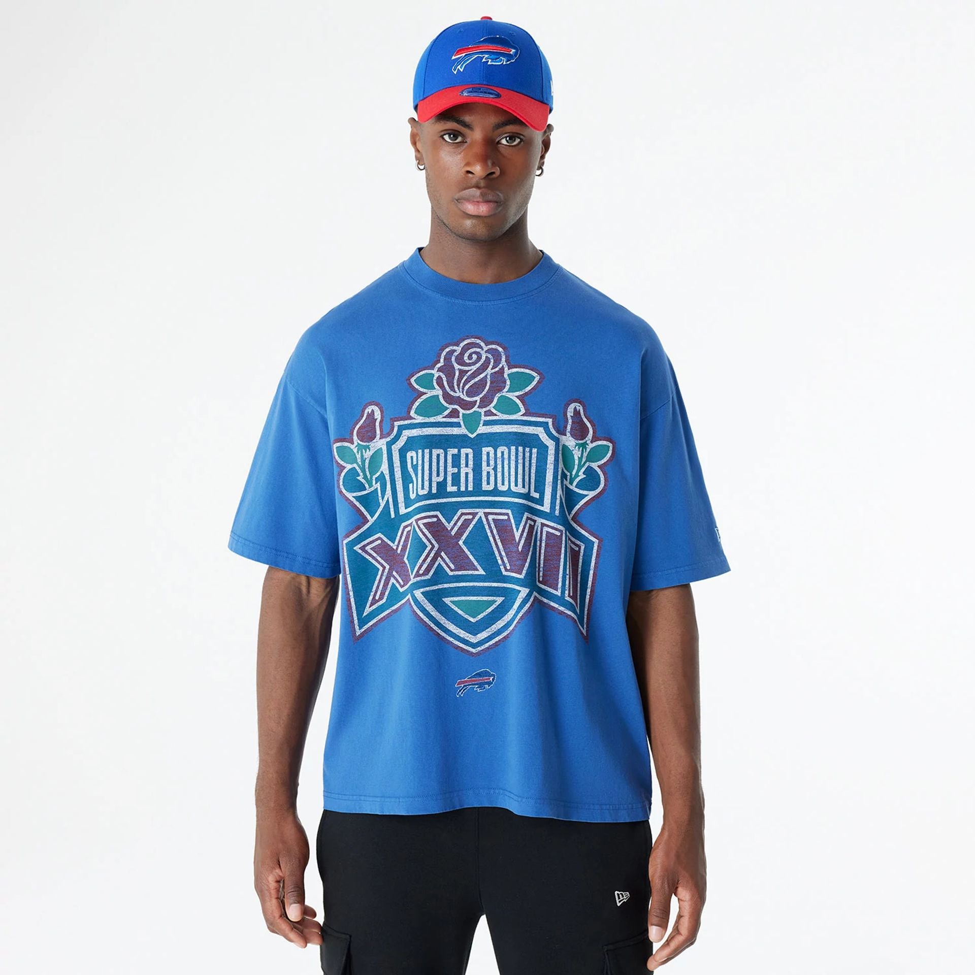 The Male model is wearing Buffalo Bills Oversized Essential Blue Oversized T-Shirt 1