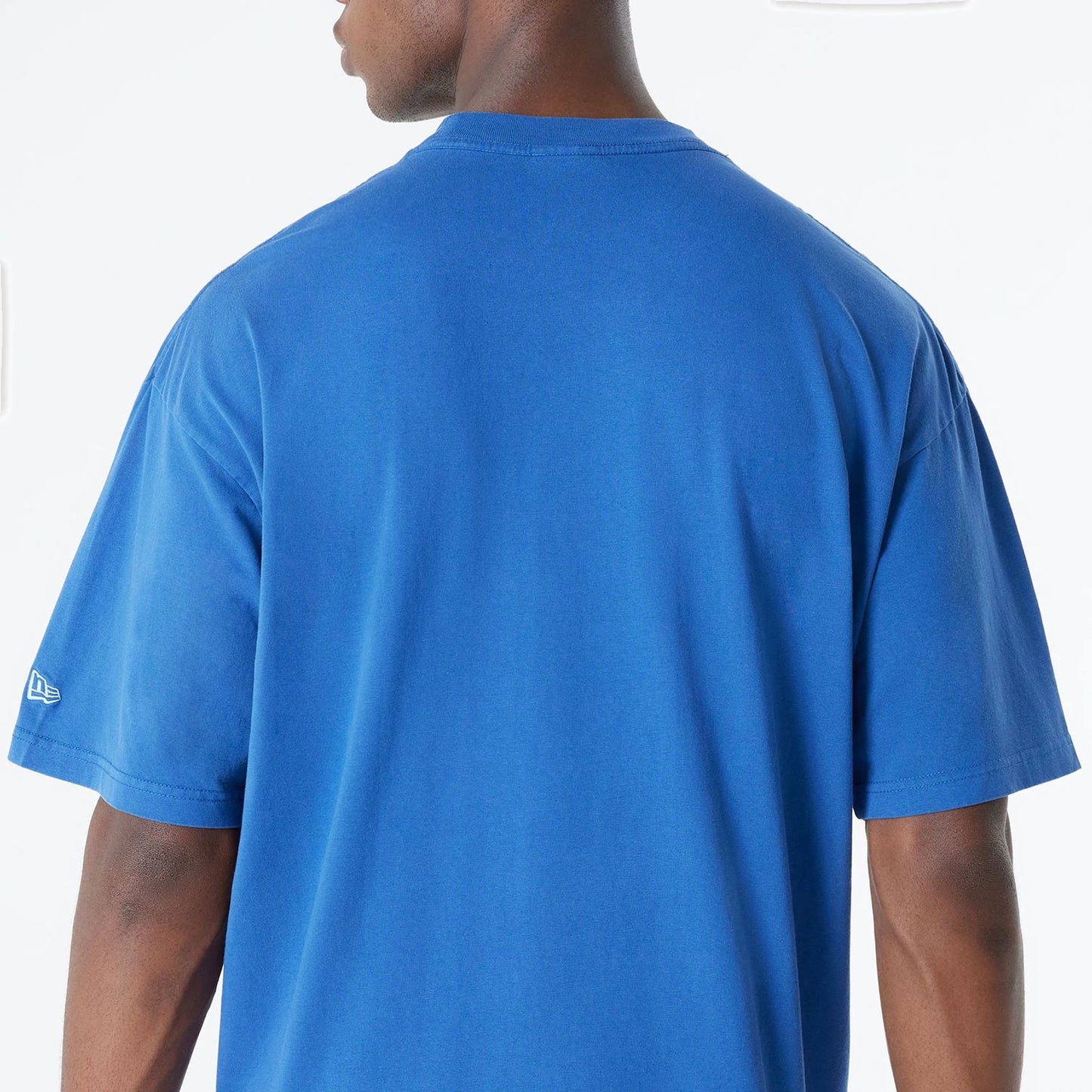 The Male model is wearing Buffalo Bills Oversized Essential Blue Oversized T-Shirt 7