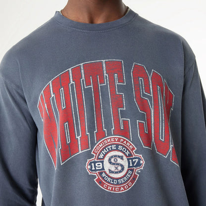 The Male model is wearing Chicago White Sox Oversized Essential Navy Oversized Long Sleeve T-Shirt 5