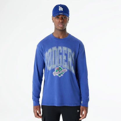 The Male model is wearing LA Dodgers Oversized Essential Dark Blue Oversized Long Sleeve T-Shirt 1