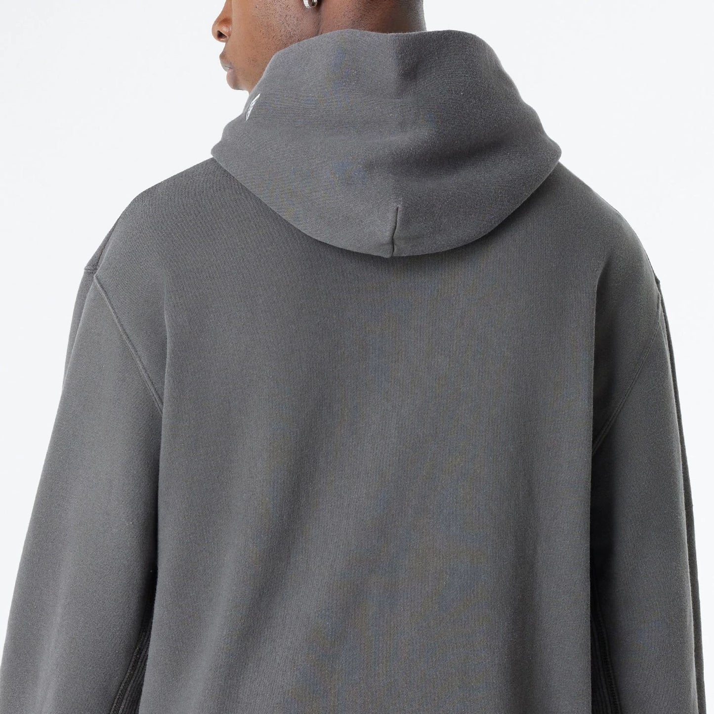 The Male model is wearing LA Dodgers Oversized Essential Dark Grey Oversized Pullover Hoodie 8