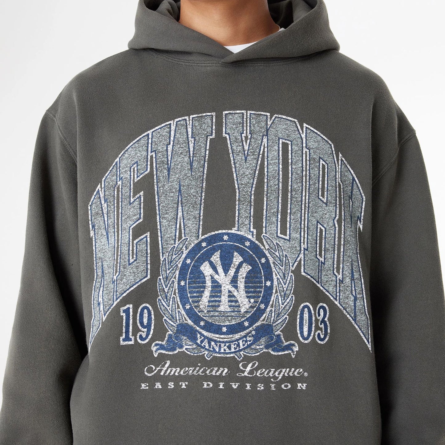 The Male model is wearing New York Yankees Oversized Essential Dark Grey Oversized Pullover Hoodie 3