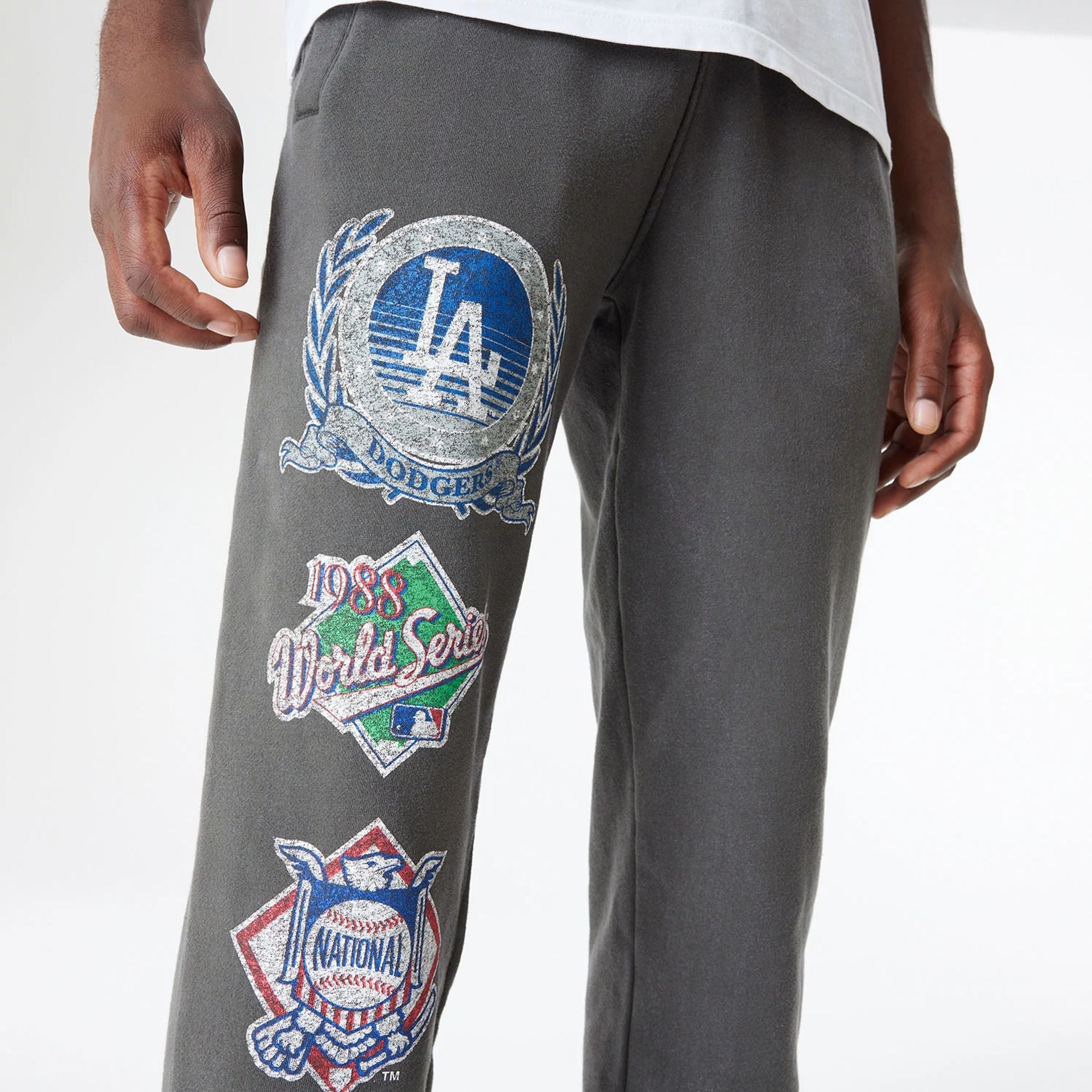 The Male model is wearing LA Dodgers Oversized Essential Dark Grey Oversized Joggers 2