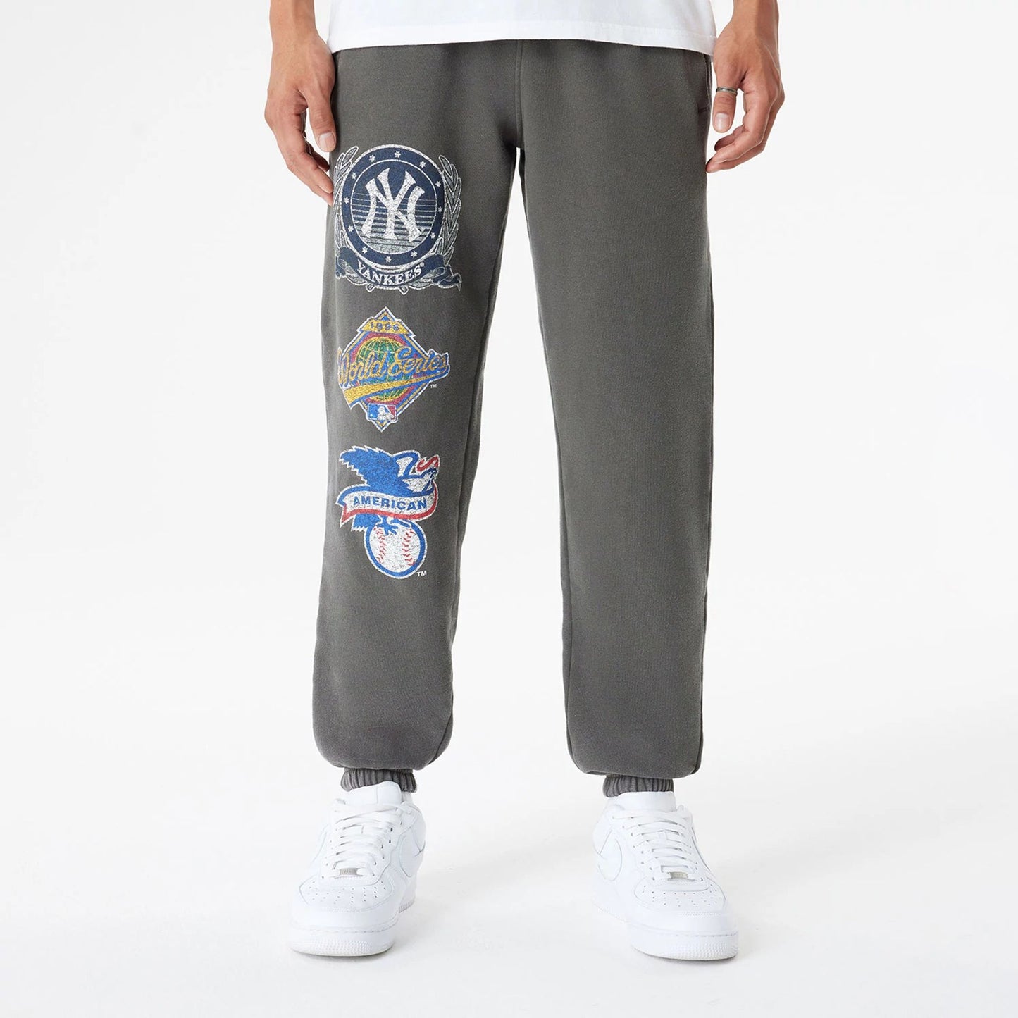 The Male model is wearing New York Yankees Oversized Essential Dark Grey Oversized Joggers 1