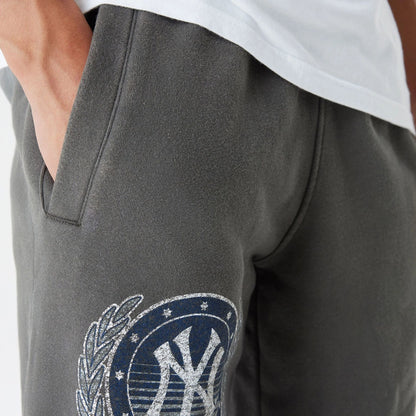 The Male model is wearing New York Yankees Oversized Essential Dark Grey Oversized Joggers 5