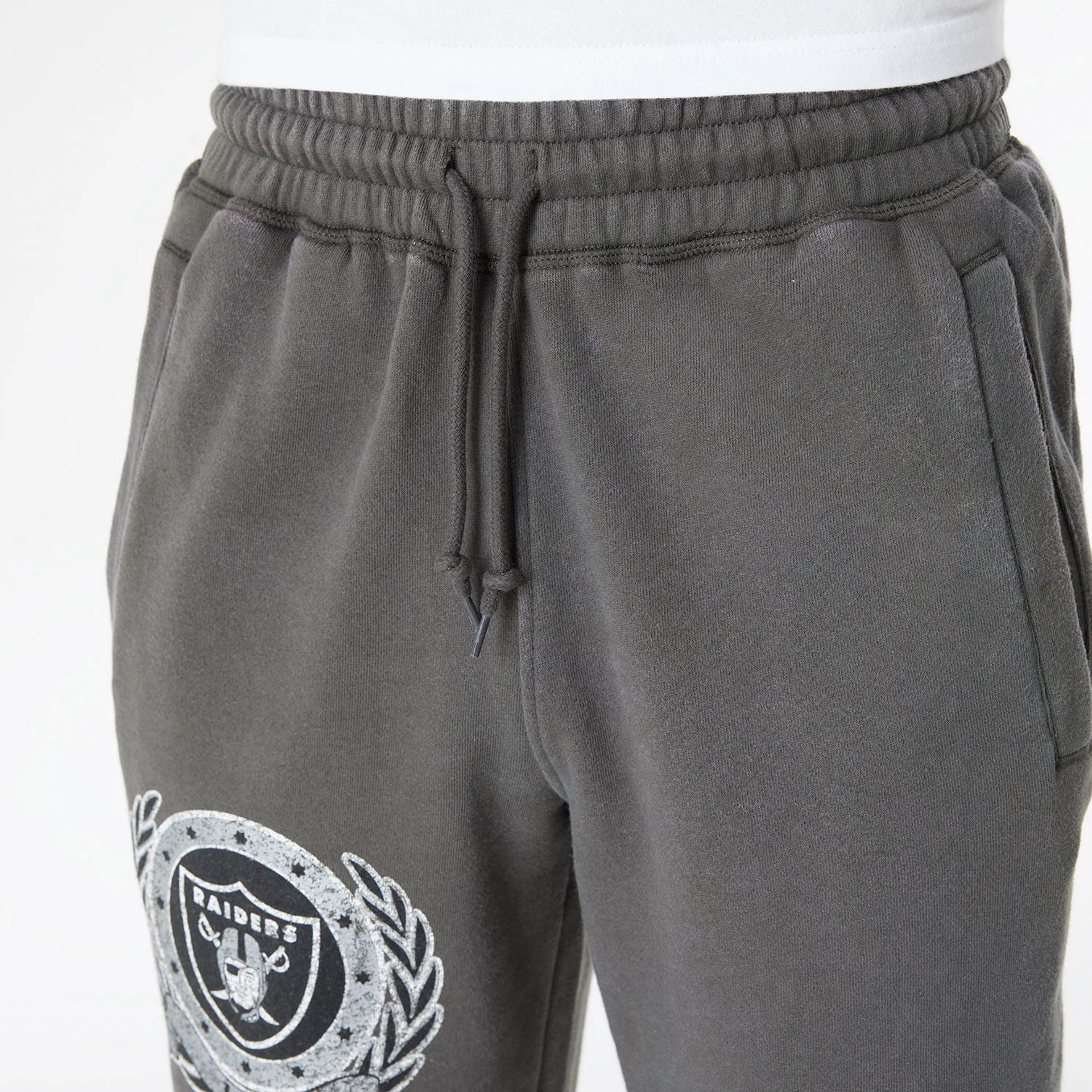 The Male model is wearing Las Vegas Raiders Oversized Essential Dark Grey Oversized Joggers 3