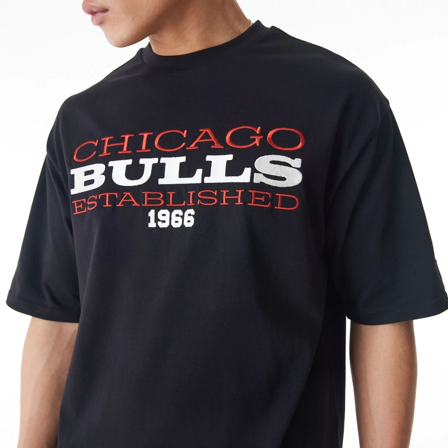 The Male model is wearing Chicago Bulls NBA Lifestyle Black T-Shirt  5