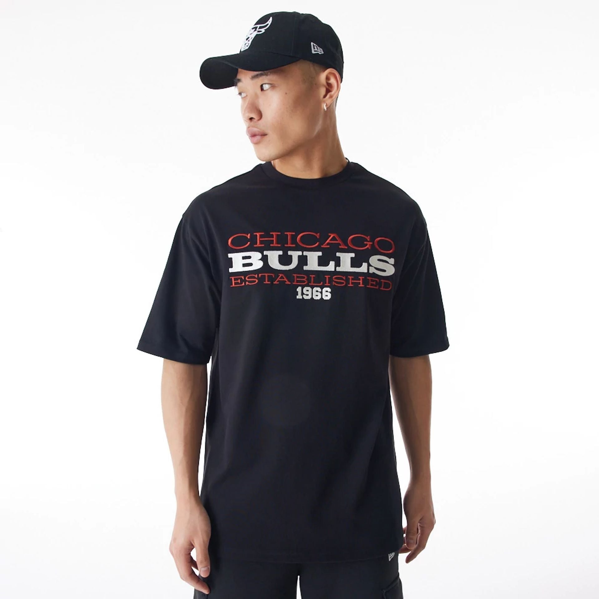 The Male model is wearing Chicago Bulls NBA Lifestyle Black T-Shirt  1