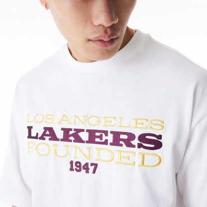 The Male model is wearing LA Lakers NBA Lifestyle White T-Shirt  5