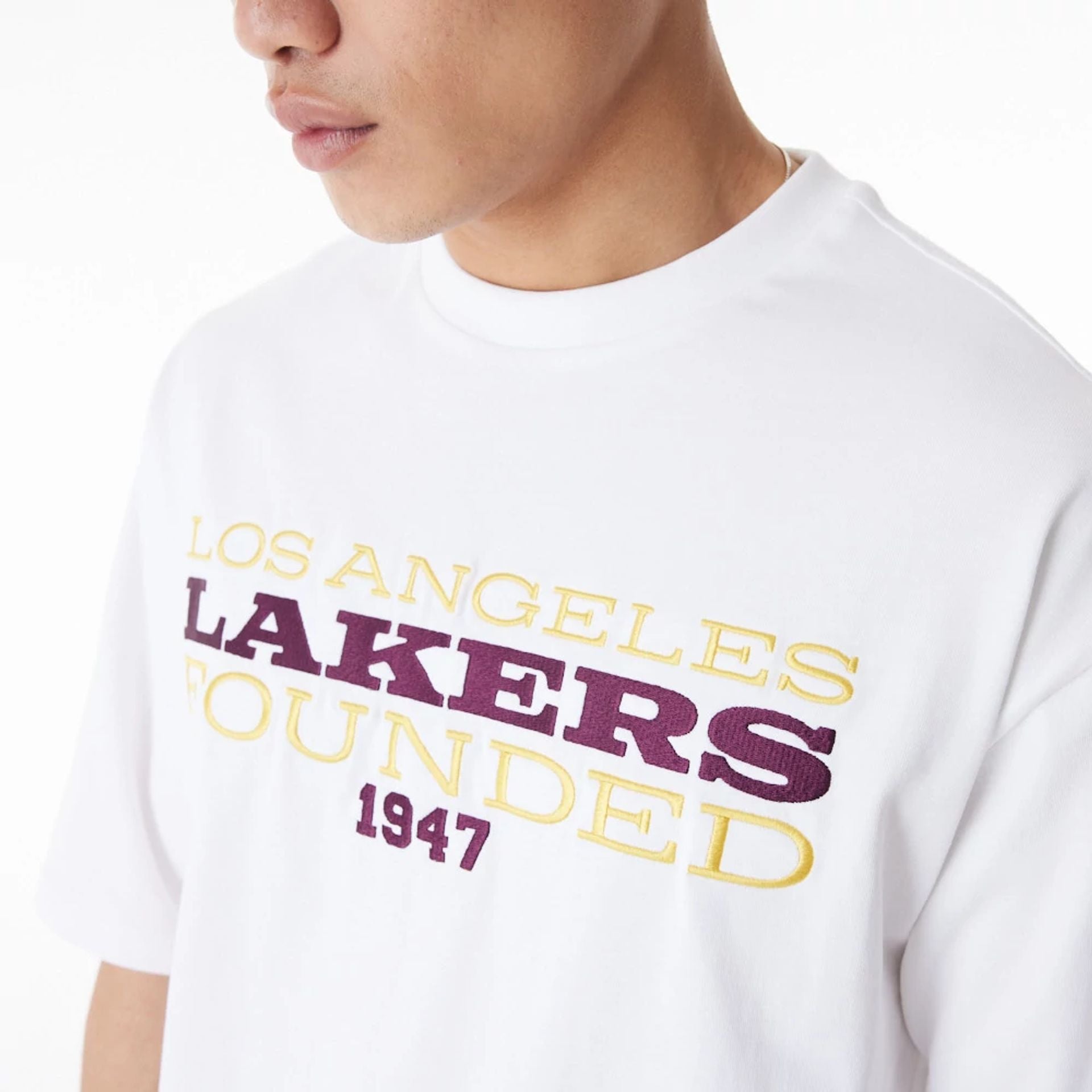 The Male model is wearing LA Lakers NBA Lifestyle White T-Shirt  3