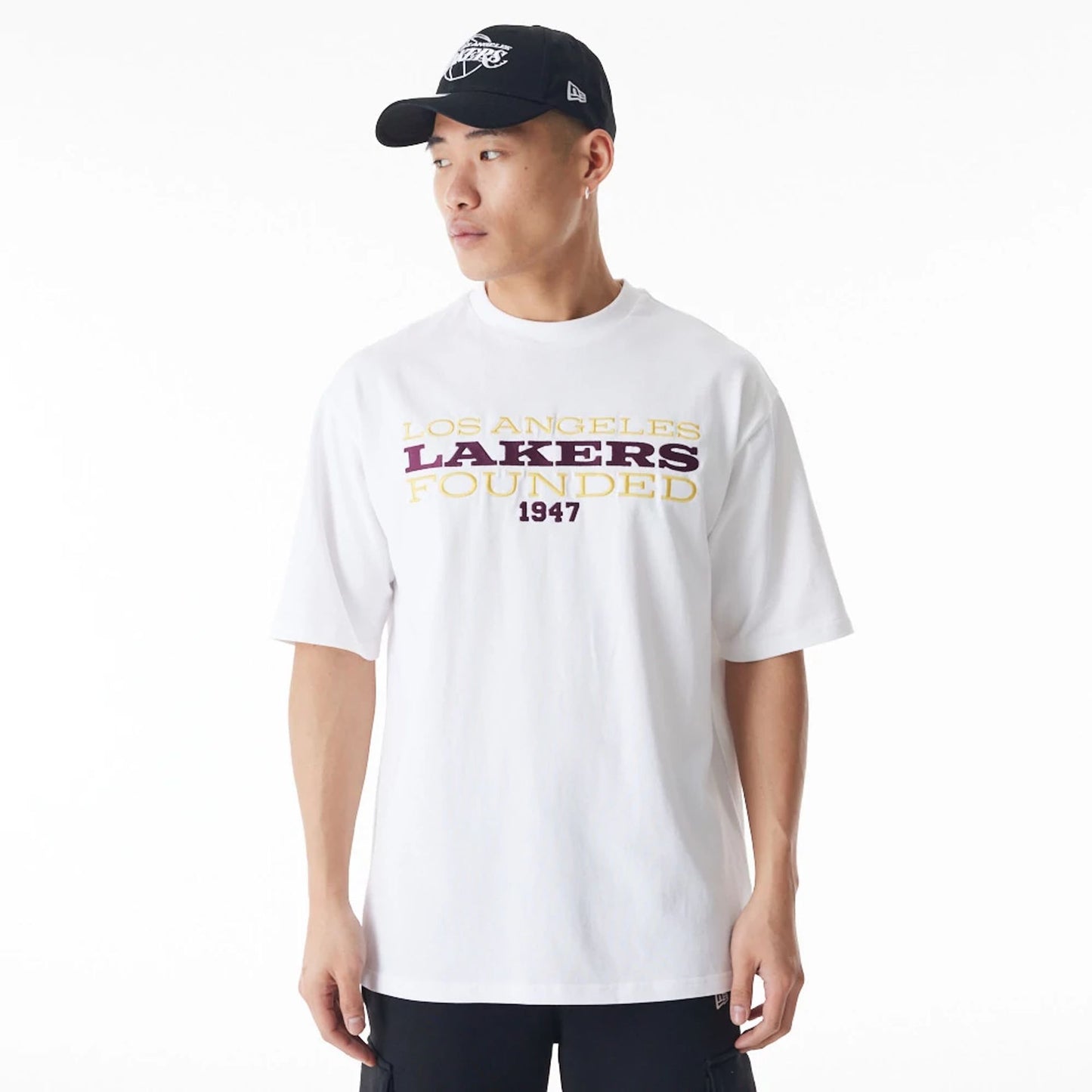 The Male model is wearing LA Lakers NBA Lifestyle White T-Shirt  1