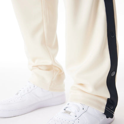 The Male model is wearing Chicago Bulls NBA Lifestyle Light Beige Straight Joggers  2