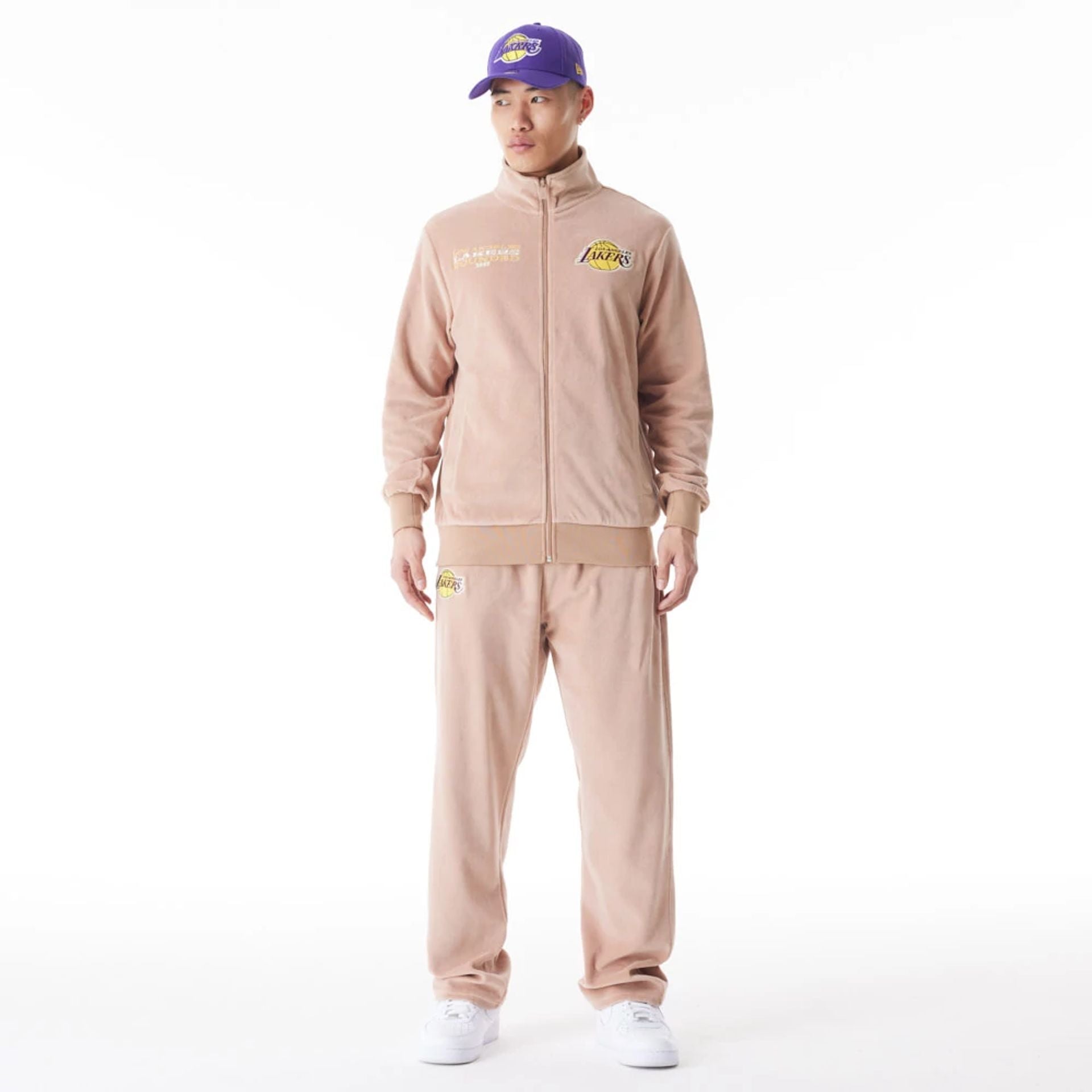 The Male model is wearing LA Lakers NBA Lifestyle Velour Beige Track Jacket  9