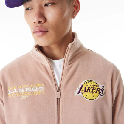 The Male model is wearing LA Lakers NBA Lifestyle Velour Beige Track Jacket  8