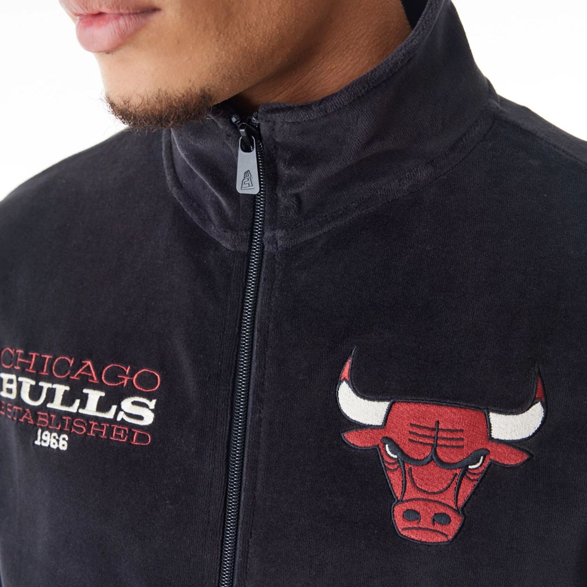 The Male model is wearing Chicago Bulls NBA Lifestyle Velour Black Track Jacket  11