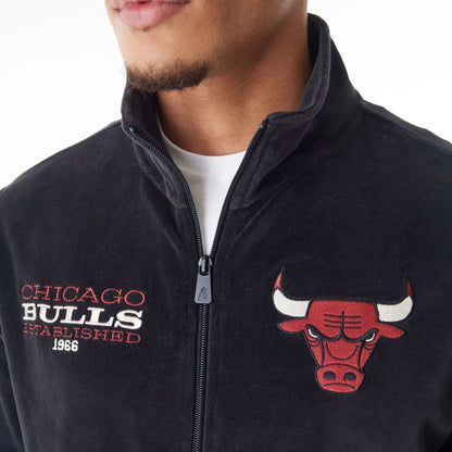 The Male model is wearing Chicago Bulls NBA Lifestyle Velour Black Track Jacket  6