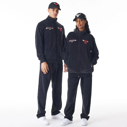 The Male model is wearing Chicago Bulls NBA Lifestyle Velour Black Track Jacket  5