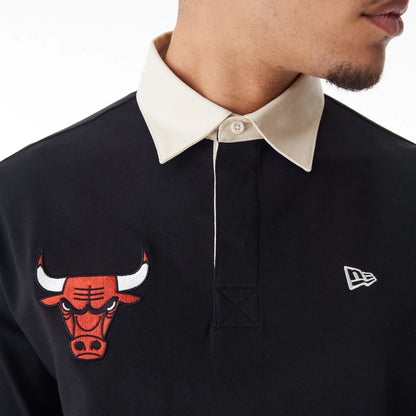 The Male model is wearing Chicago Bulls NBA Lifestyle Black Rugby Shirt  5