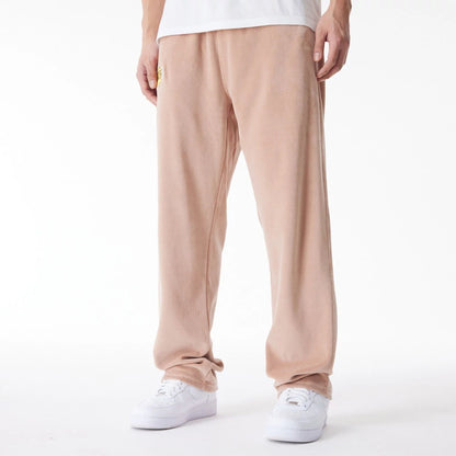 The Male model is wearing LA Lakers NBA Lifestyle Velour Beige Track Joggers  10