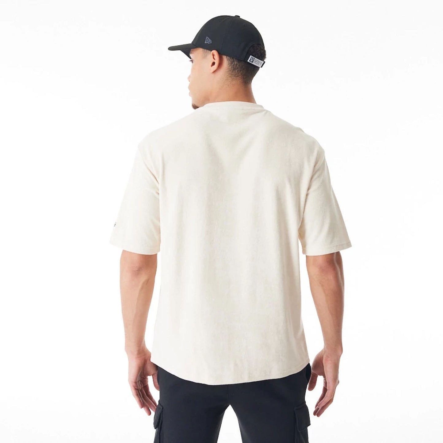 The Male model is wearing Brooklyn Nets NBA Lifestyle Velour Light Beige Oversized T-Shirt  10