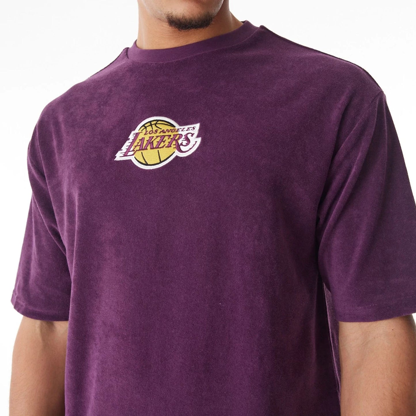 The Male model is wearing LA Lakers NBA Lifestyle Velour Dark Purple Oversized T-Shirt  4