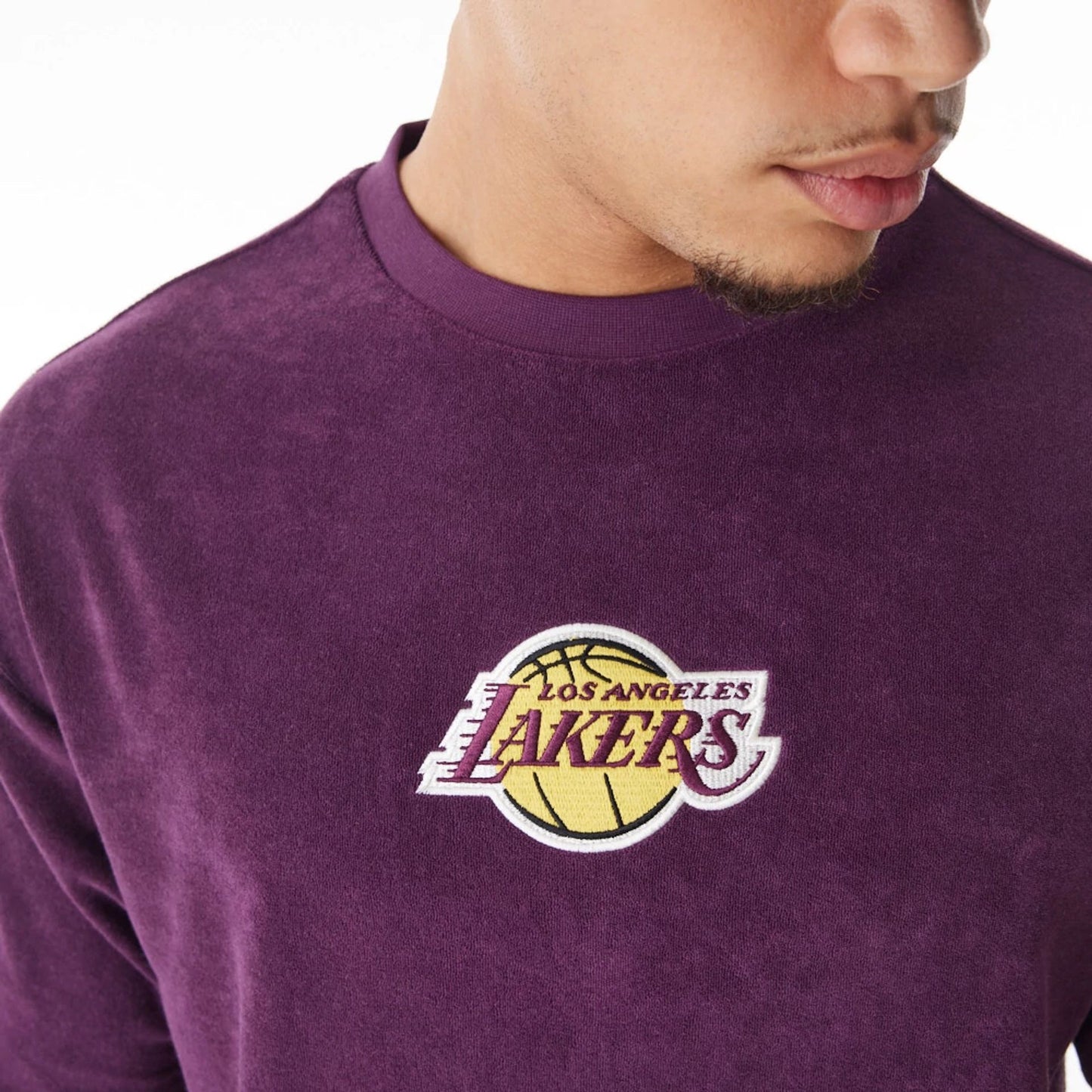 The Male model is wearing LA Lakers NBA Lifestyle Velour Dark Purple Oversized T-Shirt  6