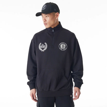 The Male model is wearing Brooklyn Nets NBA Lifestyle Black Quarter Zip Sweater  1