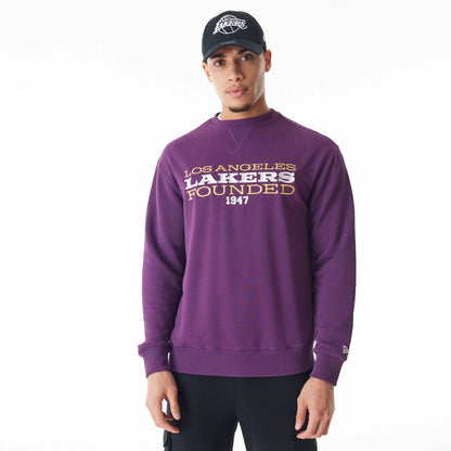 The Male model is wearing LA Lakers NBA Lifestyle Dark Purple Oversized Crew Neck Sweater  5