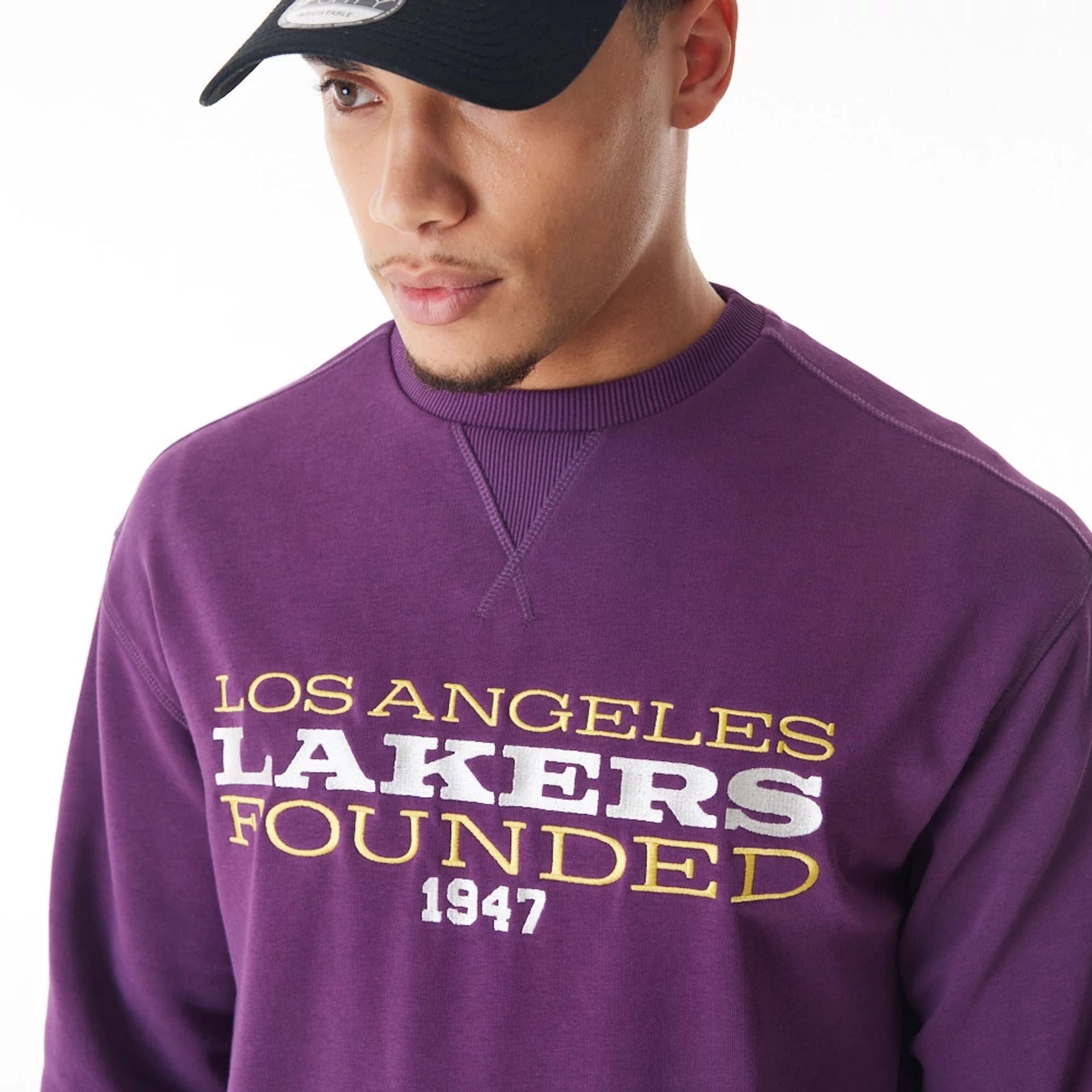 The Male model is wearing LA Lakers NBA Lifestyle Dark Purple Oversized Crew Neck Sweater  3