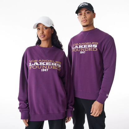 The Male model is wearing LA Lakers NBA Lifestyle Dark Purple Oversized Crew Neck Sweater  8