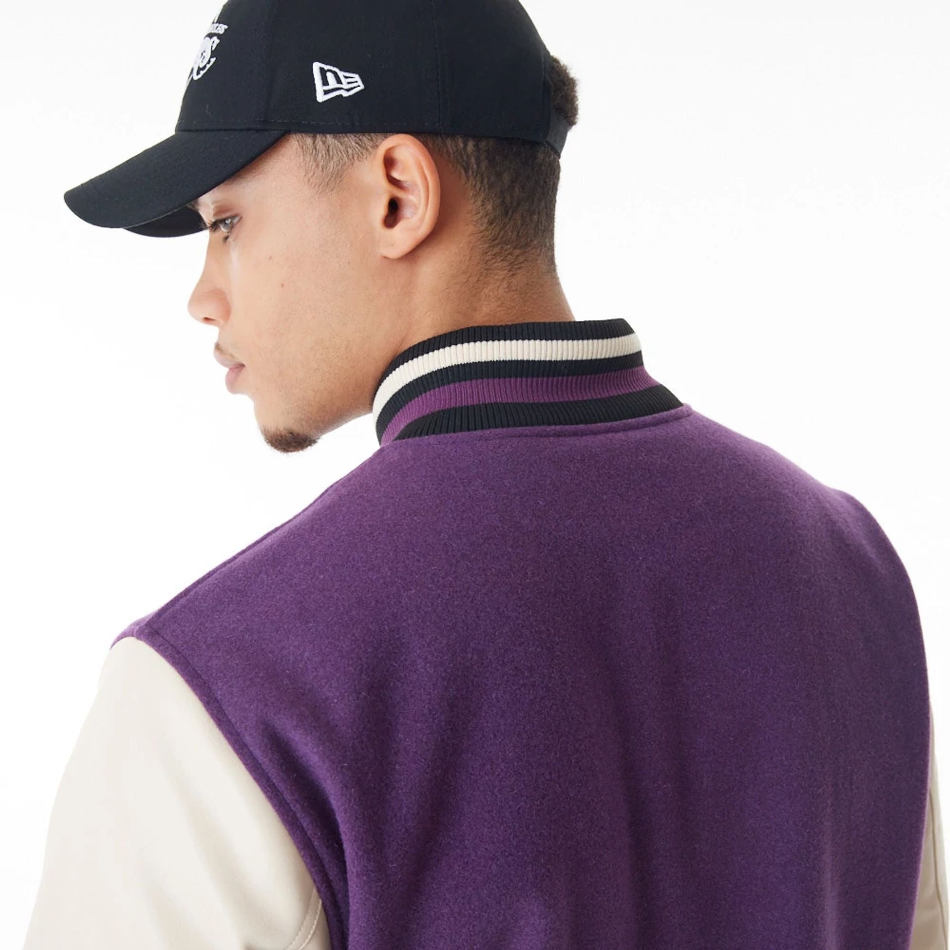 The Male model is wearing LA Lakers NBA Lifestyle Dark Purple Varsity Jacket  2