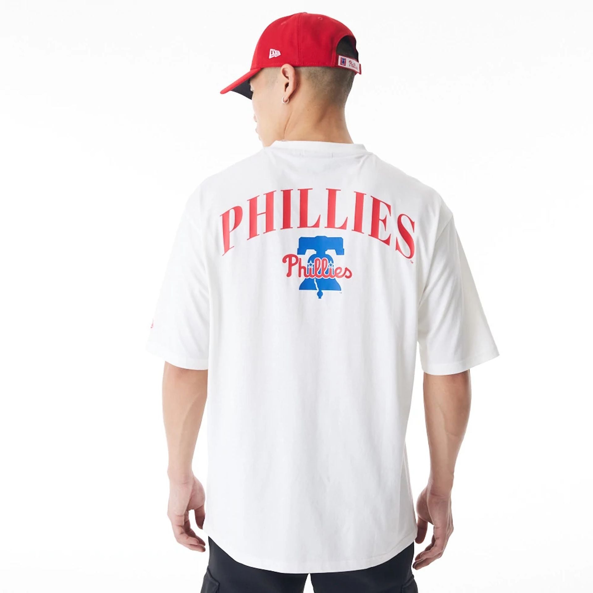 The Male model is wearing Philadelphia Phillies MLB London Series 2024 White Oversized T-Shirt 2