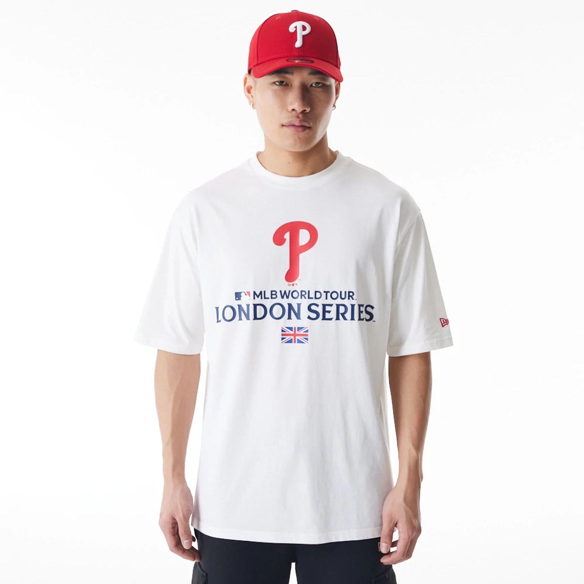 The Male model is wearing Philadelphia Phillies MLB London Series 2024 White Oversized T-Shirt 1