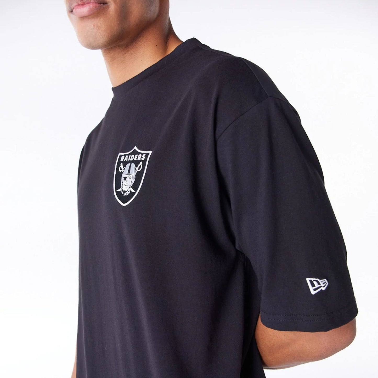 The Male model is wearing Las Vegas Raiders NFL League Essential Black Oversized T-Shirt  4