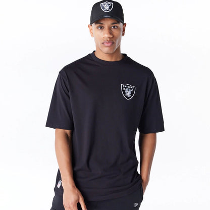 The Male model is wearing Las Vegas Raiders NFL League Essential Black Oversized T-Shirt  1