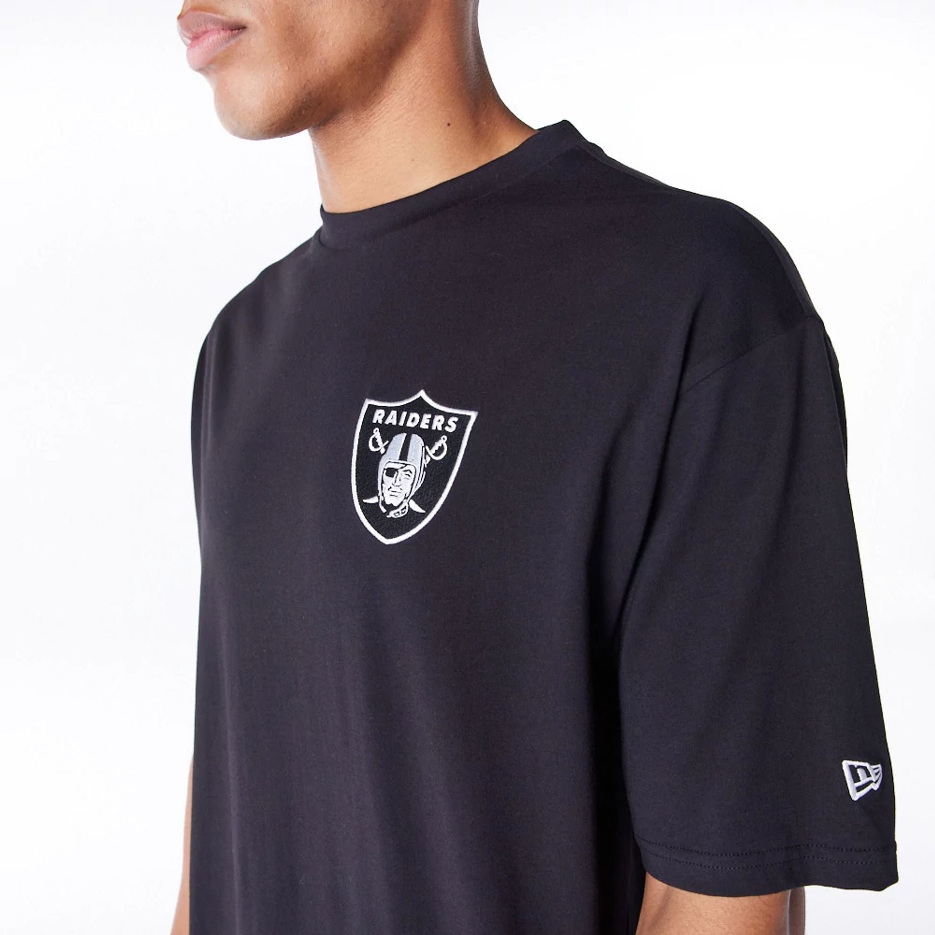 The Male model is wearing Las Vegas Raiders NFL League Essential Black Oversized T-Shirt  3