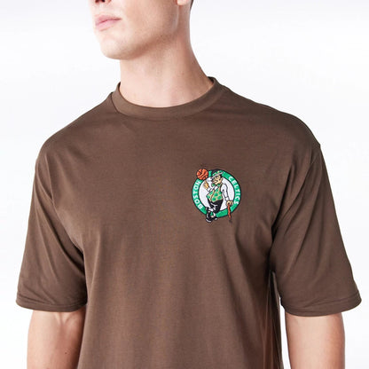 The Male model is wearing Boston Celtics League Essential Dark Brown Oversized T-Shirt  4